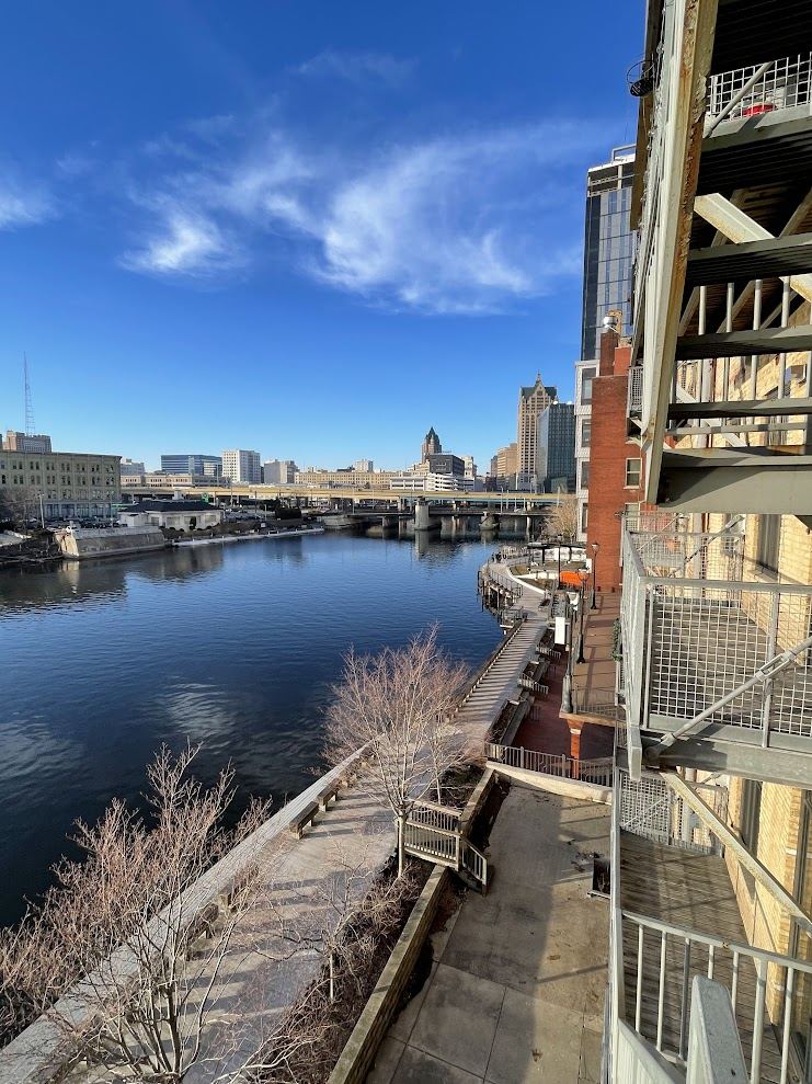 View from the building's rear fire escape down the Milwaukee Riverwalk toward downtown Milwaukee.